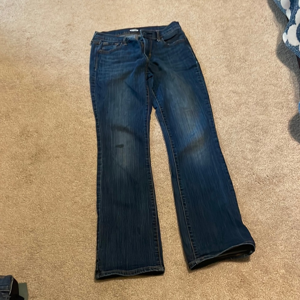 Size 2 Old Navy bootcut jeans. 1 spot on each knee. Great condition otherwise
